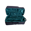 Opened Double Trumpet case laying down on its side showing green plush lined padded interior.