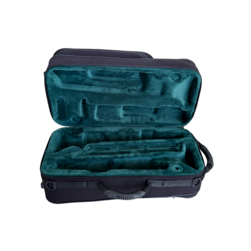 Opened Double Trumpet case laying down on its side showing green plush lined padded interior.
